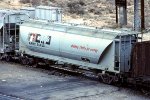 PD covered hopper NAHX #94420 with torn "Milchem" logo